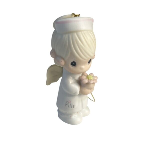Precious Moments Angel of Mercy 1986 Ornament By Samuel J. Butcher - Picture 1 of 5